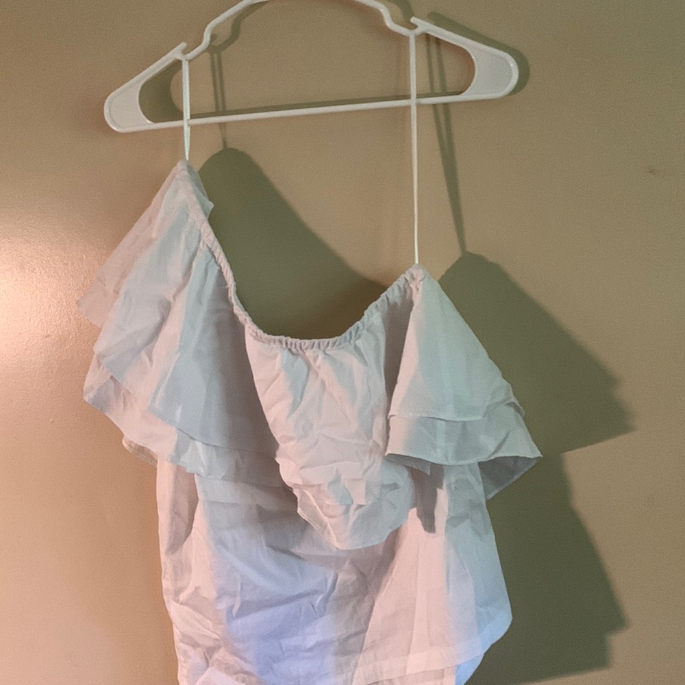 Off the shoulder white ruffly shirt